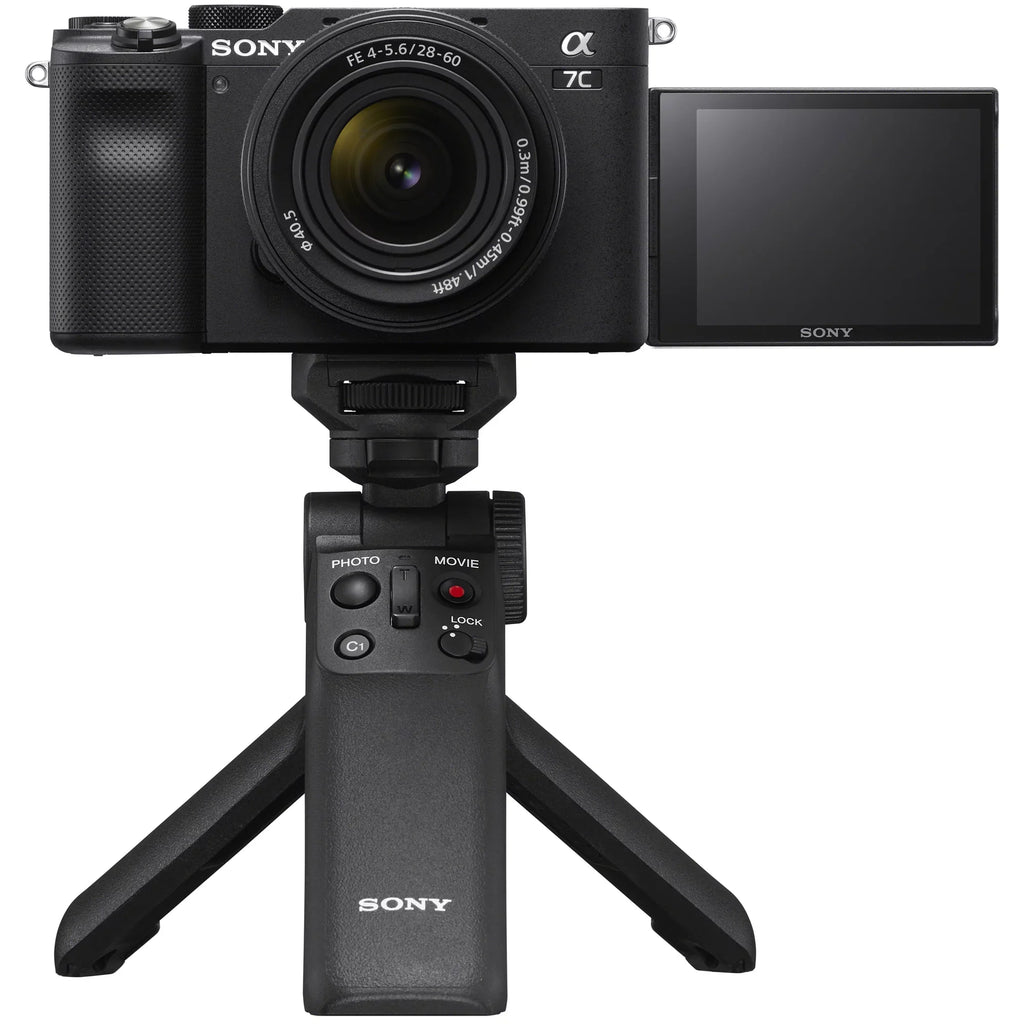 Sony a7C Mirrorless Full Frame Camera Body with 28-60mm -5.6 Lens Black / Bundle + Vlogger Kit : - Shooting Grip w. Wireless Remote + 2x Battery + Deco Gear Bag & Accessories